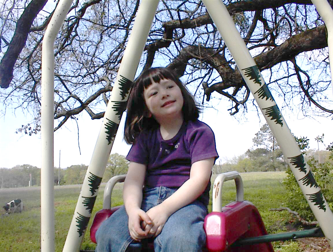 sittinonslide.jpg
